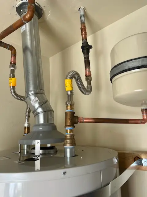 Water heater installation and plumbing repair in Pine Lake